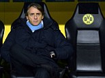 Under pressure: Roberto Mancini was powerless to stop City's 1-0 defeat to Borussia Dortmund