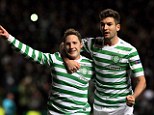 Main man: Kris Commons (left) celebrates scoring Celtic's winner