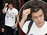 Wild sleepover? Harry Styles sports bed head hair after spending second night at Taylor Swift's hotel 