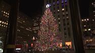 Stars help light Rockefeller Center Tree