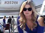 Nothing plane about her! Emily VanCamp flashes some cleavage in a tight purple dress to film private jet scenes for Revenge
