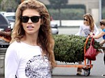 Dreaming of a white Christmas? AnnaLynne McCord dons an all-white ensemble as she picks out her tree