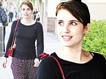 Fresh-faced and feeling festive: Emma Roberts goes make-up free to get stuck into her Christmas shopping