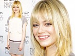 Natural beauty! Emma Stone glowed in grey and ivory frock while promoting new Revlon Nearly Naked make-up line in NYC 