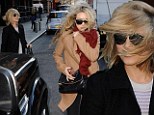 Girls' day out! Dianna Agron and Ashley Benson attempt to navigate their way to a taxi in New York City when a gust of wind hits on Wednesday afternoon