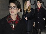 Specs appeal! Anne Hathaway sports fetching glasses and a winter coat as she joins co-star Amanda Seyfried for Les Miserables screening 