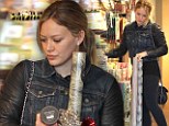It's a wrap! Hilary Duff stocks up on wrapping paper for the festive season as she prepares for baby Luca's first Christmas
