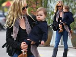 Fashionista in the making: Delilah del Toro shows off her mini Ugg boots on a day out with her mother Kimberly Stewart