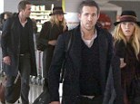 Bon voyage, Mr and Mrs Reynolds! Ryan and Blake Lively look glum as they jet out of Paris