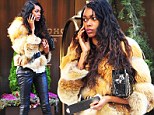 The way she struts: Model Jessica White was a traffic stopper in leather leggings and fur jacket in front of the Soho Hotel in New York City on Wednesday