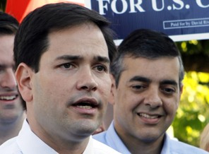 FILE - In this Republican U.S. Senate candidate Marco Rubio, left, talks to reporters as David Rivera, Republican candidate for Congress, right, looks on in Miami. Rubio's relationship with fellow freshman lawmaker Rivera, now facing a federal probe into tax evasion, and a credit card controversy surfaced during his 2010 Senate campaign and didn't have much effect. But that doesn't mean the country as a whole would overlook such eyebrow-raising issues, if Rubio were to show interest in the No. 2 slot on the presidential ticket this year. (AP Photo/Alan Diaz, File)