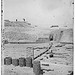 Charleston, South Carolina. Photographer [Samuel Cooley] on parapet of Fort Sumter photographing soldier (LOC)