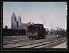 General view of part of the south Water street freight depot of the Illinois Central Railroad, Chicago, Ill. A C and O R.R. caboose. the C and O is one of the railroads that lease terminal facilities from the I.C.R.R (LOC) by The Library of Congress