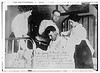 Dr. James F. Grant, ships surgeon, fixing Gordon Davidson, survivor of EMPRESS OF IRELAND, in Hotel Frontenac at Quebec (LOC) by The Library of Congress