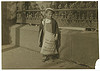 Freddie Kafer, a very immature little newsie selling Saturday Evening Posts and newspapers at the entrance to the State Capitol.... Sacramento, California (LOC) by The Library of Congress