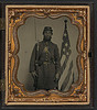 [Unidentified soldier in Union uniform and Company H cap with bayoneted musket, cap box, and Volunteer Maine Militia (VMM) belt buckle in front of American flag] (LOC) by The Library of Congress