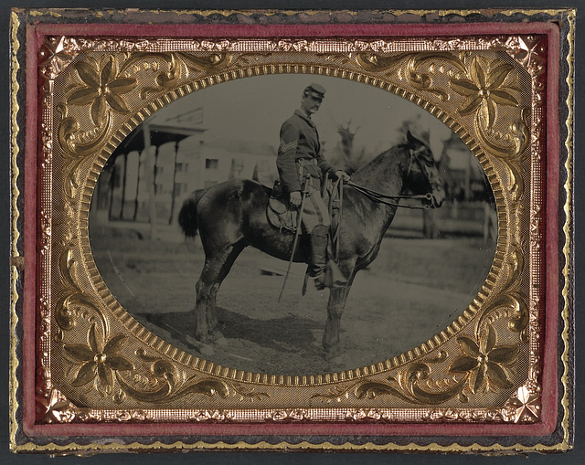 [Unidentified soldier in Union sergeant's uniform with sword seated on a horse] (LOC)
