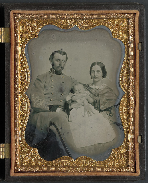 [Unidentified soldier in Confederate uniform with wife and baby] (LOC)