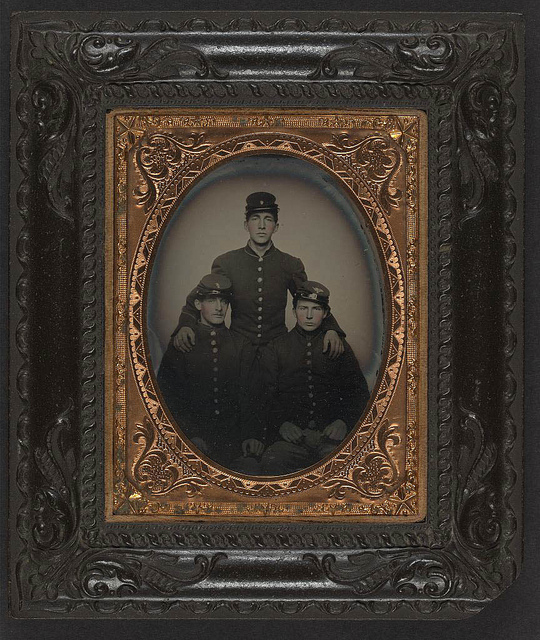 [Three unidentified soldiers in Union uniforms and Company E, 8th Regiment forage caps] (LOC)