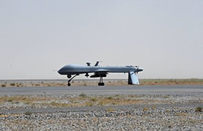 TO GO WITH: Pakistan-unrest-Afghanistan,FOCUS by Emmanuel Duparcq and S.H. Khan
(FILES) In this file picture taken on on June 13, 2010, a US Predator unmanned drone armed with a missile stands on the tarmac of Kandahar military airport.  Times are hard for Al-Qaeda in Afghanistan and Pakistan as the network has been weakened significantly by US drone strikes on their hideouts, the killing of founder Osama bin Laden in May 2011 and by finances drying up.    AFP PHOTO/FILES/POOL/Massoud HOSSAINI (Photo credit should read MASSOUD HOSSAINI/AFP/Getty Images)
