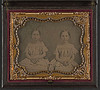 [Two unidentified young girls, probably sisters, wearing matching dresses] (LOC) by The Library of Congress