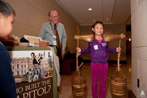 An education cart at the Capitol Visitor Center teaches children about the construction of the U.S. Capitol and the workers who helped to build it.