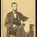 [Abraham Lincoln, U.S. President. Seated portrait, holding glasses and newspaper, Aug. 9, 1863] (LOC)