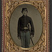 [Unidentified young soldier in Union artilleryman's uniform standing with Eaglehead sword] (LOC)