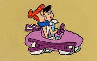 Betty Rubble Driving and Wilma Flintstone Riding in a Car