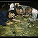 Camouflage class in New York University, where men and women are preparing for jobs in the Army or in industry, New York, N.Y. They make models from aerial photographs, re-photograph them, then work out a camouflage scheme and make a final photograph (LOC