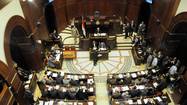 Egypt adopts draft constitution after marathon session