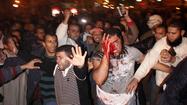 Thousands protest outside Egypt's presidential palace