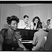 [Portrait of Dizzy Gillespie, Mary Lou Williams, Tadd Dameron, Hank Jones, Milt Orent, Dixie Bailey, and Jack Teagarden, Mary Lou Williams' apartment, New York, N.Y., ca. Aug. 1947] (LOC)