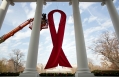AIDS Ribbon Is Hung From The White House