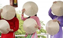 Passport DC packs the month of May with free, family-friendly performances, such as these traditional Vietnamese dancers, on stages around the city. 