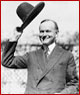 Image of Calvin Coolidge doffing his hat