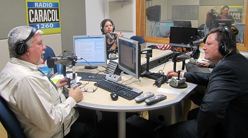 Assistant Secretary of State for Public Affairs Mike Hammer participates in a radio interview at a station in Miami, Florida, December 2012. [State Department photo/ Public Domain]