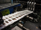 Copies of The Orange County Register slide through the presses. The Register is the country's 20th most-read daily, with a circulation of about 285,000.