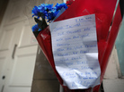 Flowers and a note outside the apartments near King Edward VII Hospital in central London where Jacintha Saldanha and other nurses stayed.