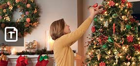 Triming a Christmas tree