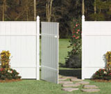 White fence with gate open