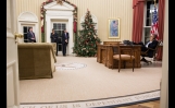 President Barack Obama Talks On The Phone In The Oval Office