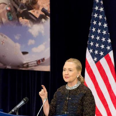 Photo: U.S. Secretary of State Hillary Rodham Clinton addresses reporters at NATO Headquarters in Brussels, Belgium, December 5, 2012. [State Department photo/ Public Domain]