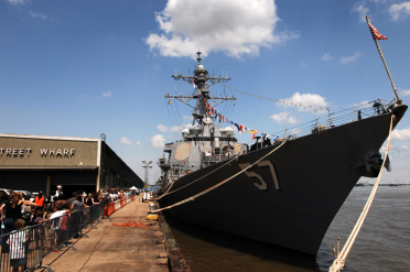 Visitors await the public boarding of the USS Mitscher (DDG 57) during New Orleans Navy Week. (U.S. Navy photo by Mass Communications Specialist 1st Class Mark O'Donald/Released)