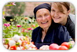 Young Woman in Garden with Elderly Woman