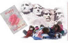 picture of kids playing in snow, a valentine, and Mt. Rushmore