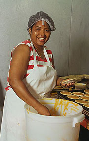 Worker at the Sweet Potato Pie company.