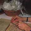 Thumbnail image of Mary Wooton in the Library's Conservation 
Office treating the autograph manuscript