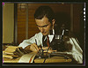 Geologist examining cuttings from wildcat well, Amarillo, Texas (LOC) by The Library of Congress