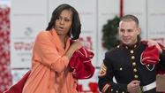 Raw: Michelle Obama helps with Toys for Tots